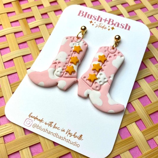 The Nash Bash Cow Print Cowgirl Boots