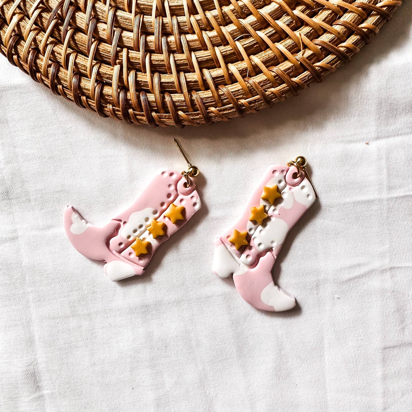 The Nash Bash Cow Print Cowgirl Boots