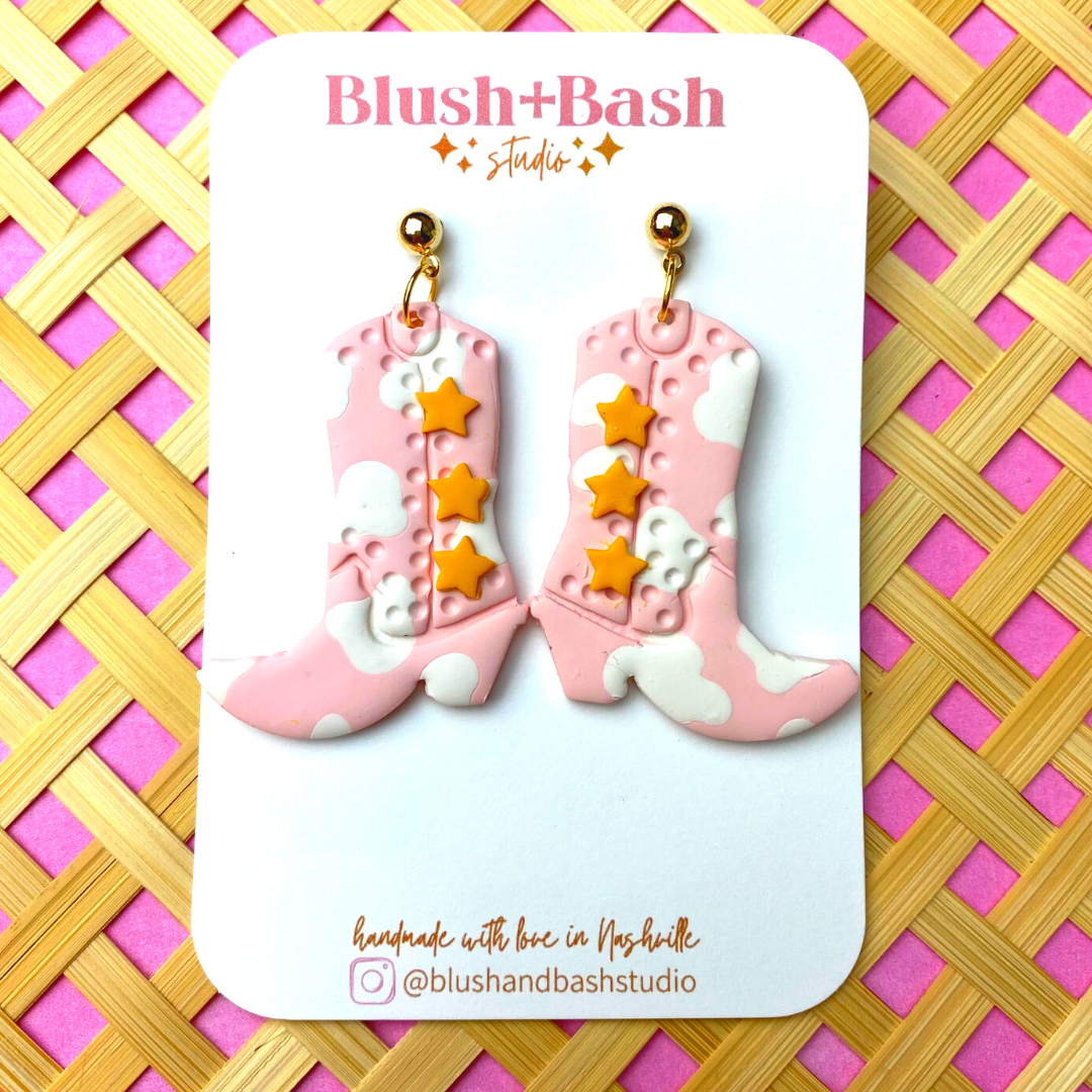 The Nash Bash Cow Print Cowgirl Boots