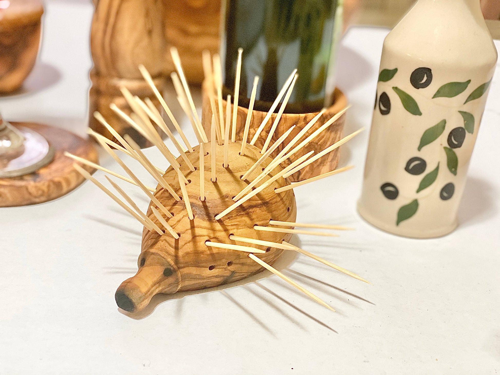 Olive wood hedgehog porcupine with holes to hold and display toothpicks